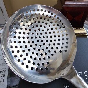 Kitchen Connection Stainkess Steel Skimmer. Large size, 20"